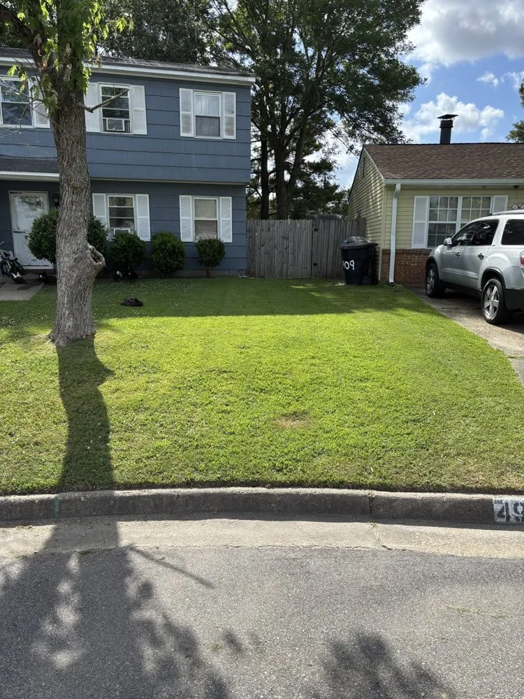 Affordable lawn mowing service with custom design in Virginia Beach, VA by Vet 214 Cuts