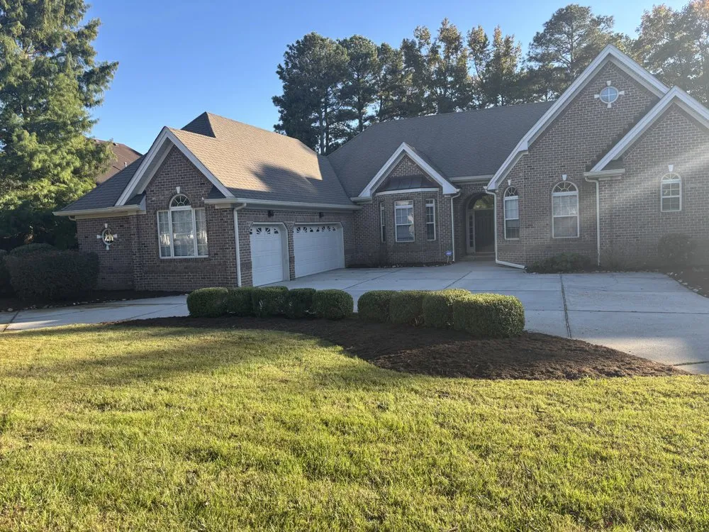 Affordable landscape installation for homes in Virginia Beach, VA by Vet 214 Cuts