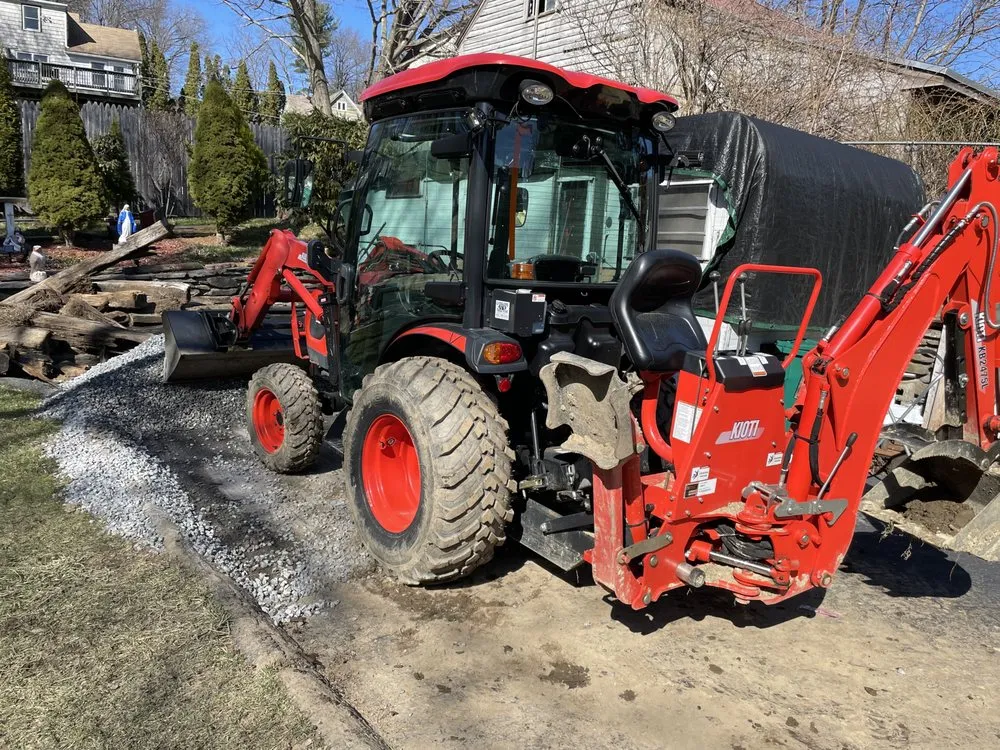Reliable yard maintenance in Fitchburg, MA by Veteran Compact Tractor Service