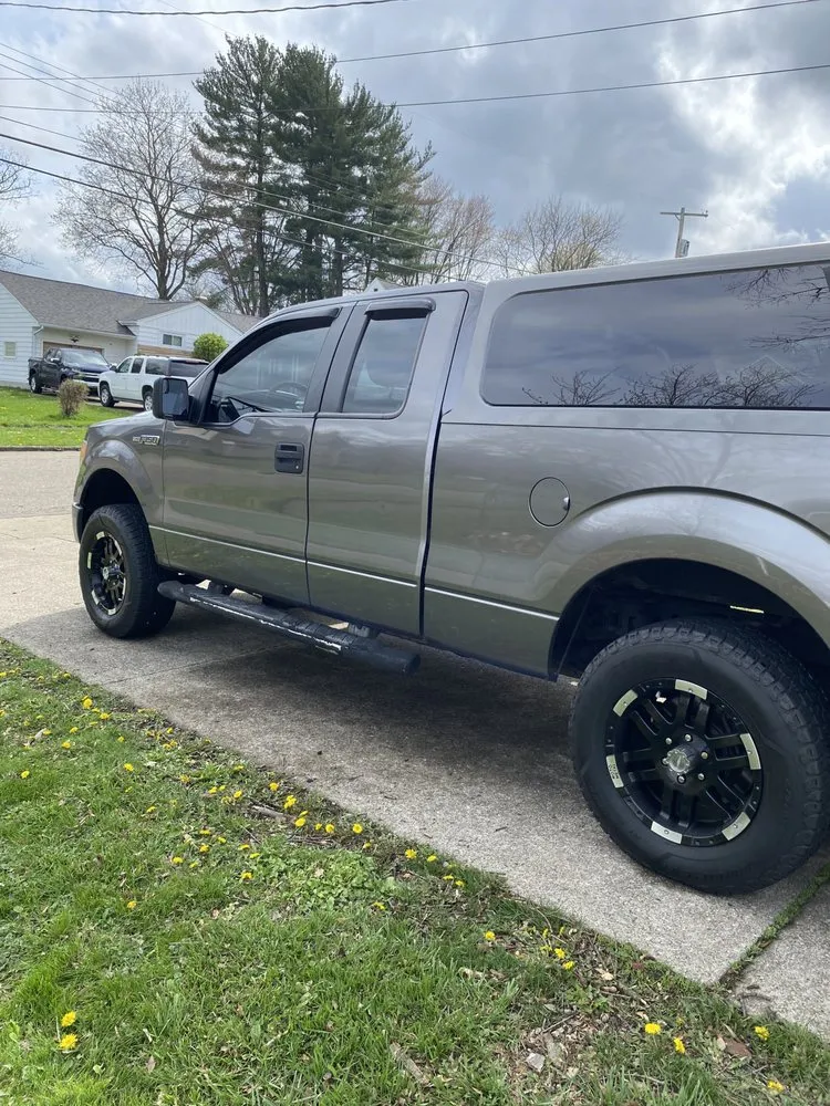 Affordable lawn mowing service with custom design across Youngstown, OH - Veteran Millers Mowing And Trimming