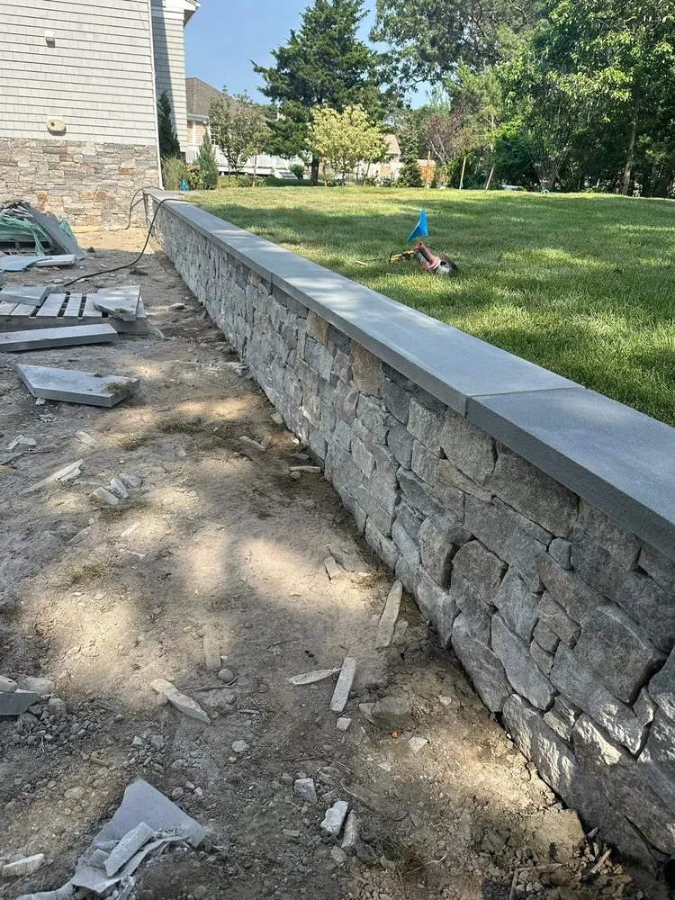 Affordable lawn care service in North Kingstown, RI by Vetscape and Property Maintenance