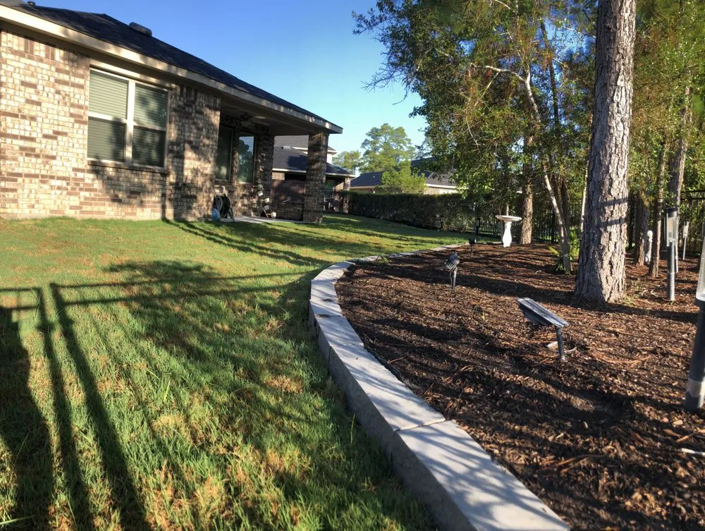 Custom garden landscaping for year-round maintenance in Conroe, TX by VFG Landscaping Service