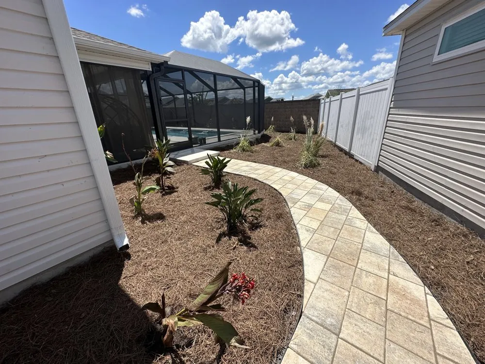 Expert yard maintenance for residential properties in The Villages, FL by Vibrant services