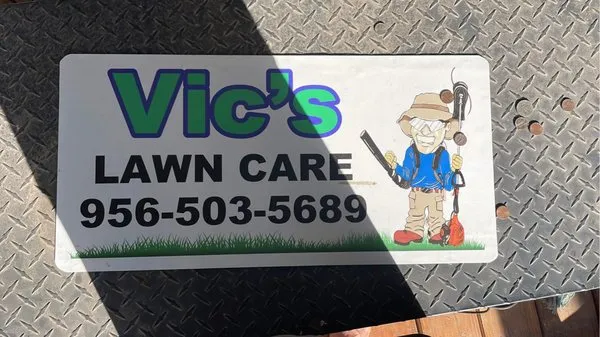 Vics Quality Cuts Lawn Care Logo