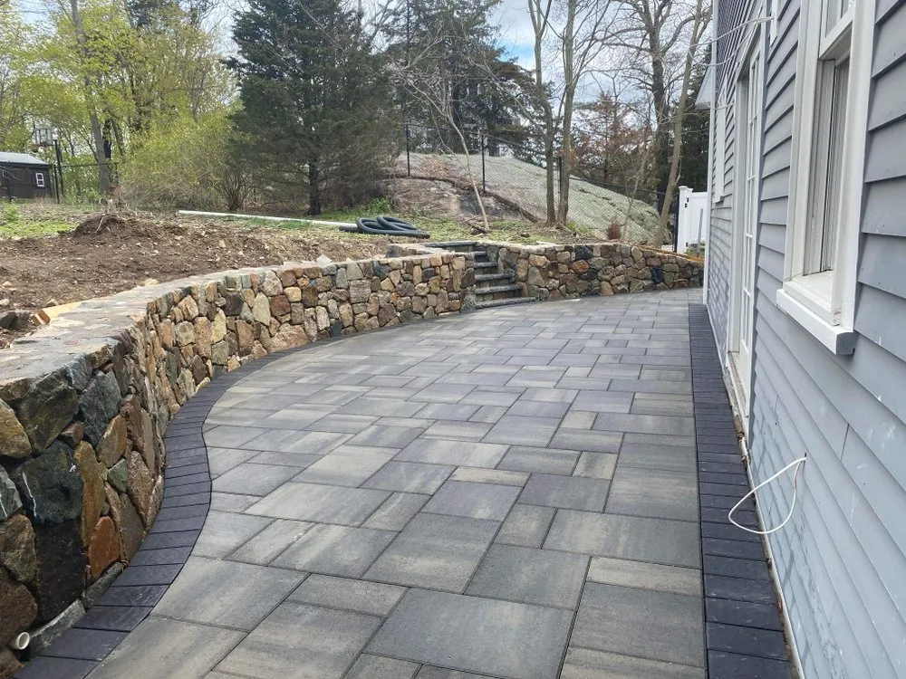 Local lawn mowing service for year-round maintenance across Lynn, MA - Victor Hardscape & Masonry