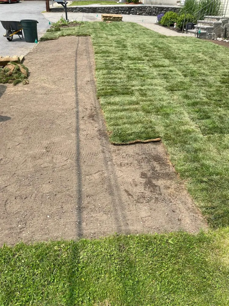 Professional yard cleanup service for homes across Woburn, MA - Victor’s Landscaping & Construction