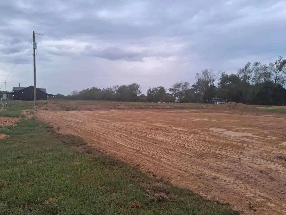 Custom landscape installation with custom design in Woodbury, TN by Victory Dirt Works