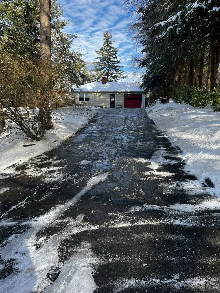 Professional yard cleanup service for year-round maintenance in Westfield, MA by Victory Lane Landscapes