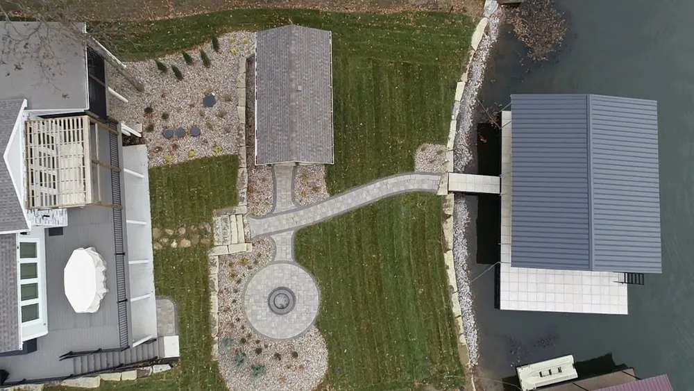 Custom lawn mowing service for residential properties in Gallatin, MO by Viking Dirtworks and Landscaping