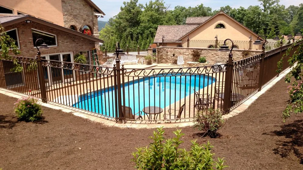 Trusted lawn mowing service with custom design across Port Matilda, PA - Village Craft Iron Works