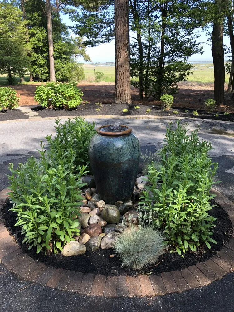 Affordable yard maintenance with custom design across Ocean City, MD - Village Greens Landscaping