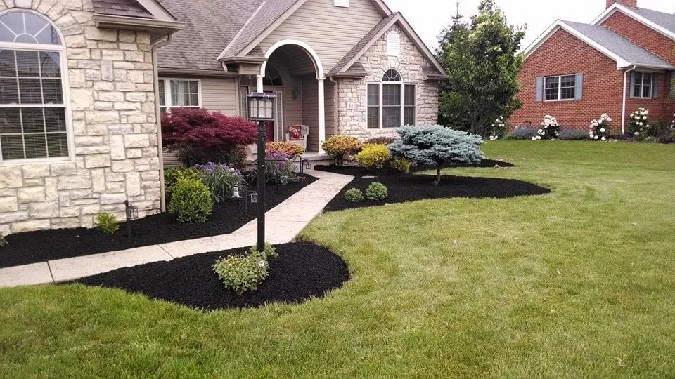 Expert yard maintenance with custom design in Newark, OH by Village Landscapes