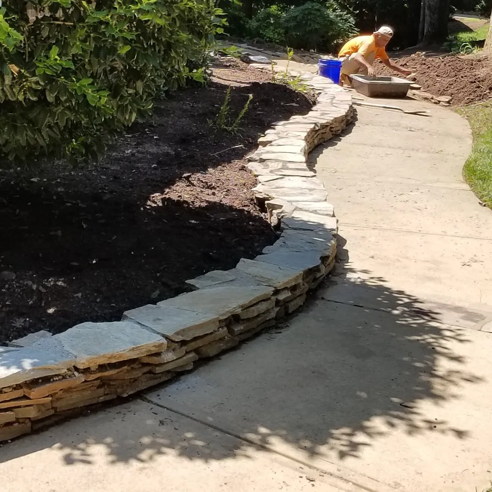 Professional lawn mowing service with custom design in Wake Forest, NC by Vincent DiPasquale Landscaping