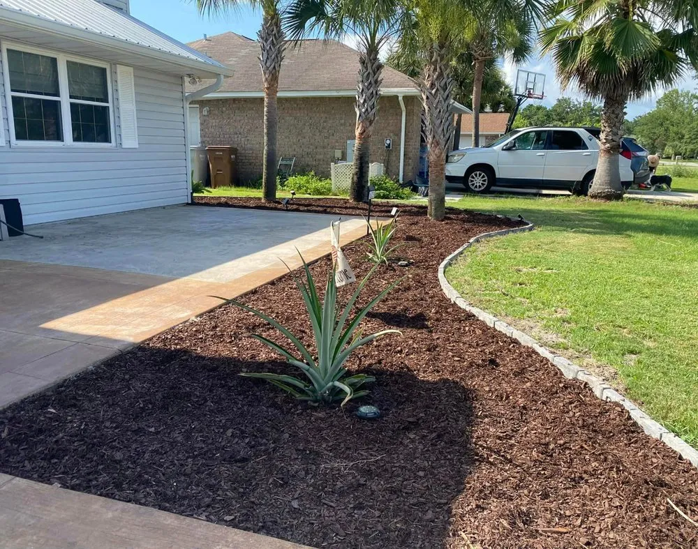 Trusted yard cleanup service with custom design in Pensacola, FL by Vine and Branches Lawn and Tree Service