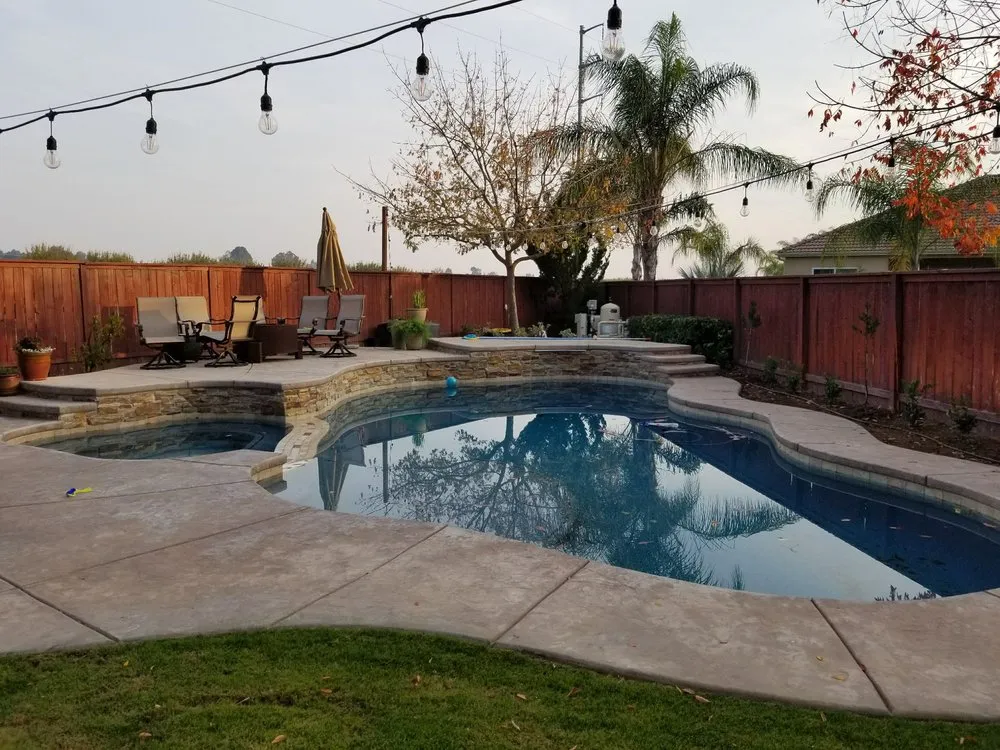Professional residential landscaping with custom design across Clovis, CA - Vineyard Pools