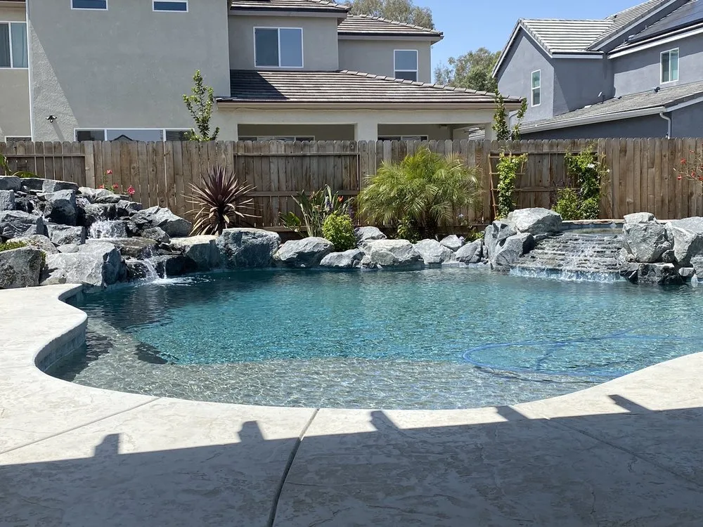 Trusted lawn mowing service for outdoor upgrades in Clovis, CA by Vineyard Pools