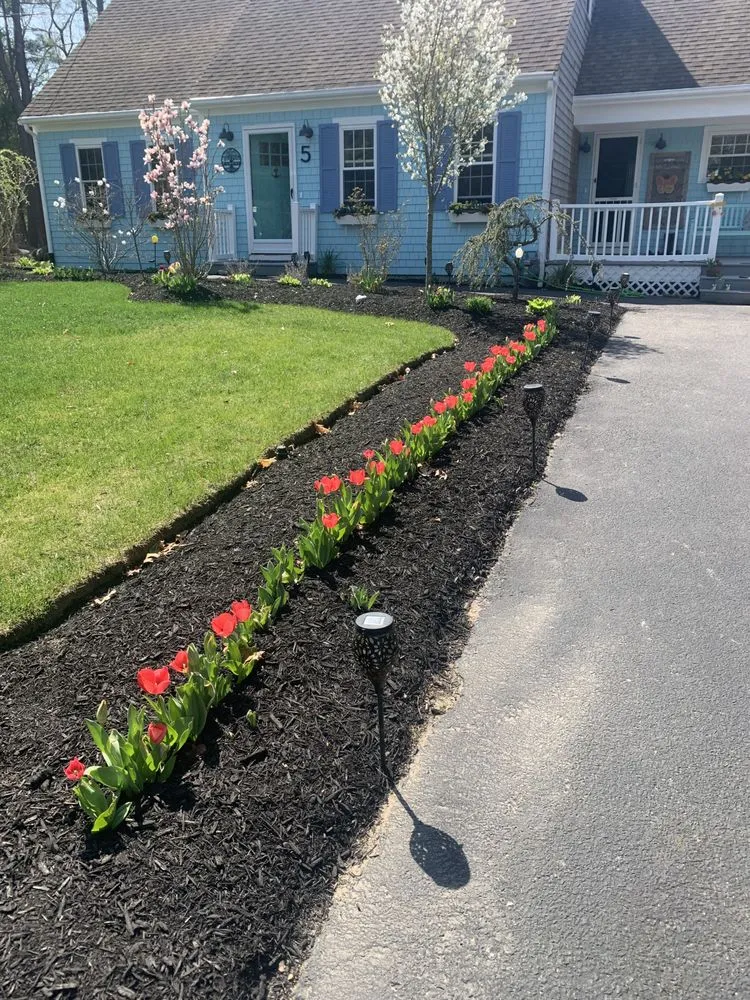 Custom lawn care service near you in Raynham, MA by Vinny & Campos Landscaping