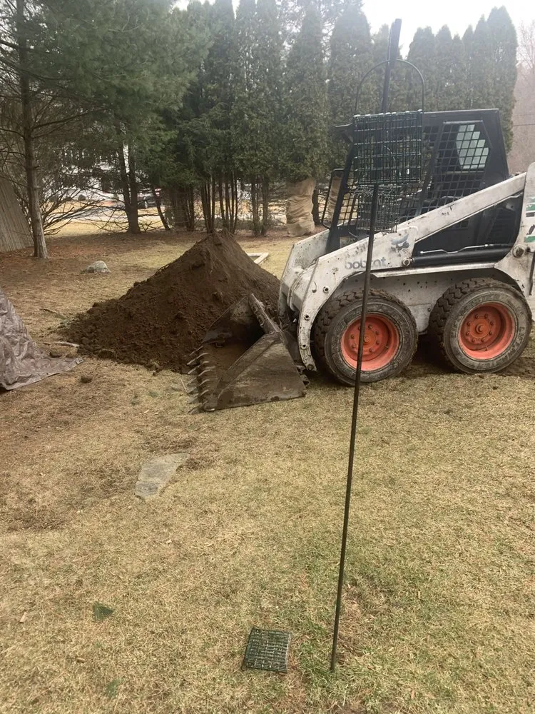 Affordable landscape installation for beautiful yards in Raynham, MA by Vinny & Campos Landscaping