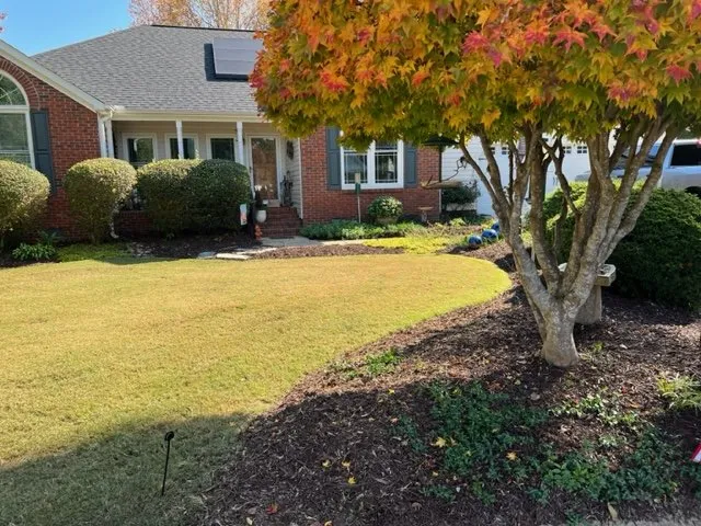 Professional landscape installation with custom design in Fountain Inn, SC by Vintage Lawn Care