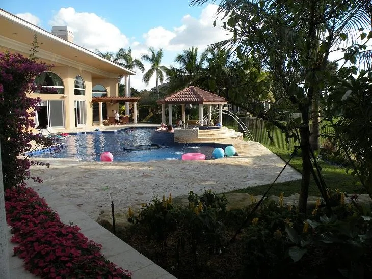 Custom outdoor landscaping with custom design in Plantation, FL by VIP Construction Services