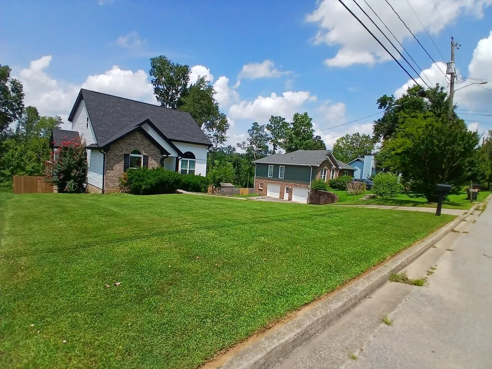 Custom landscape design for year-round maintenance in Clarksville, TN by VIP Lawn Care