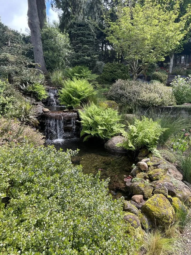 Custom landscape design for year-round maintenance in Clackamas, OR by Viridian Landscaping