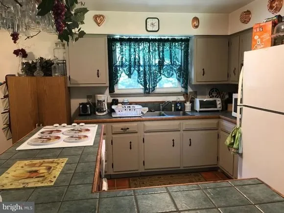 Custom garden landscaping for year-round maintenance in Mount Holly, NJ by Visions Konect