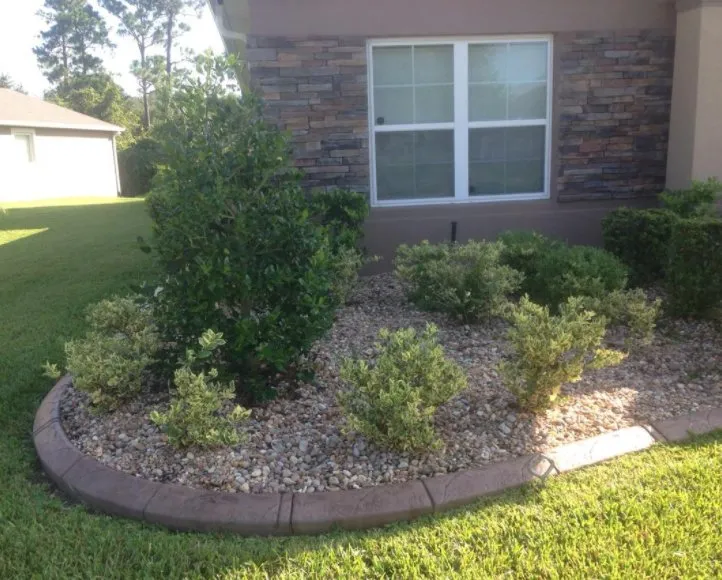 Custom yard maintenance with custom design across Port Orange, FL - Visual Impact Curbing
