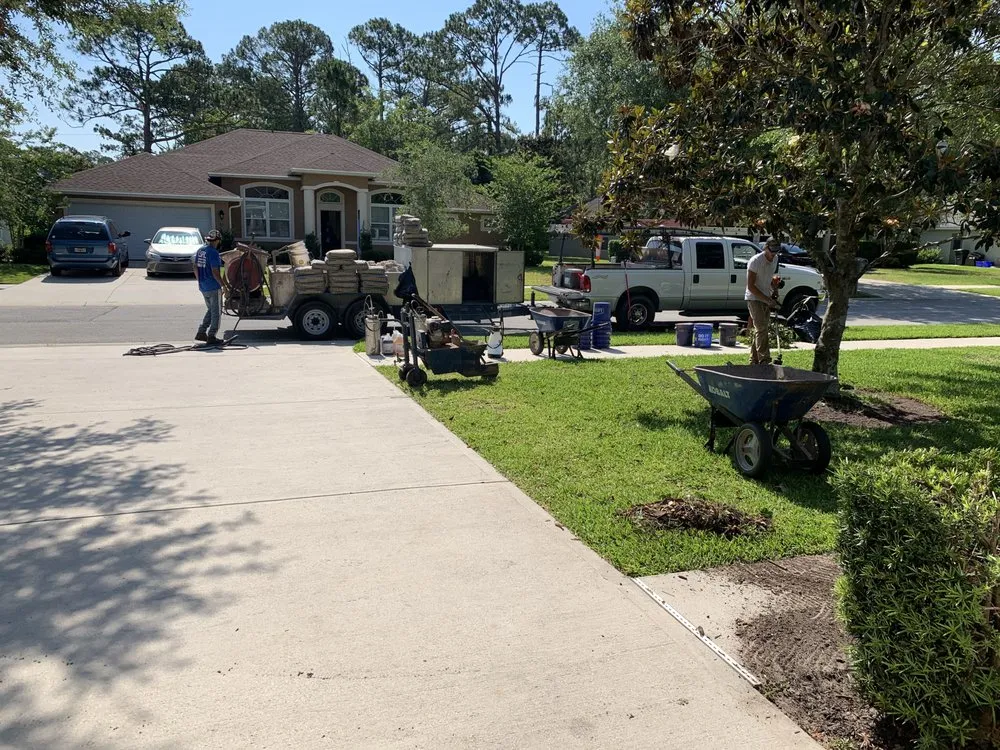 Trusted lawn mowing service for residential properties in Port Orange, FL by Visual Impact Curbing