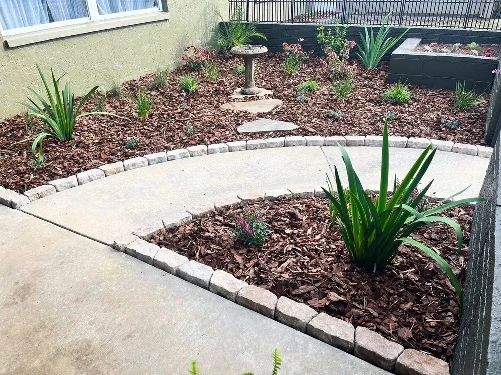 Custom garden landscaping with custom design in Hudson, FL by Vorce Family Property Maintenance