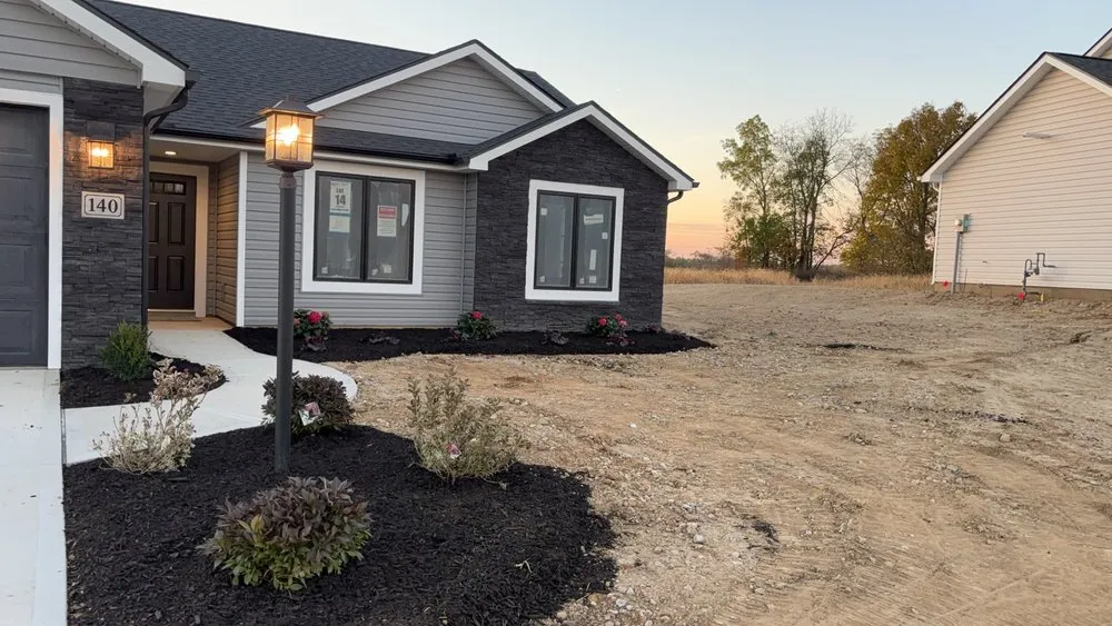 Custom landscape design for residential properties in Columbia City, IN by Vose & Sons Landscaping