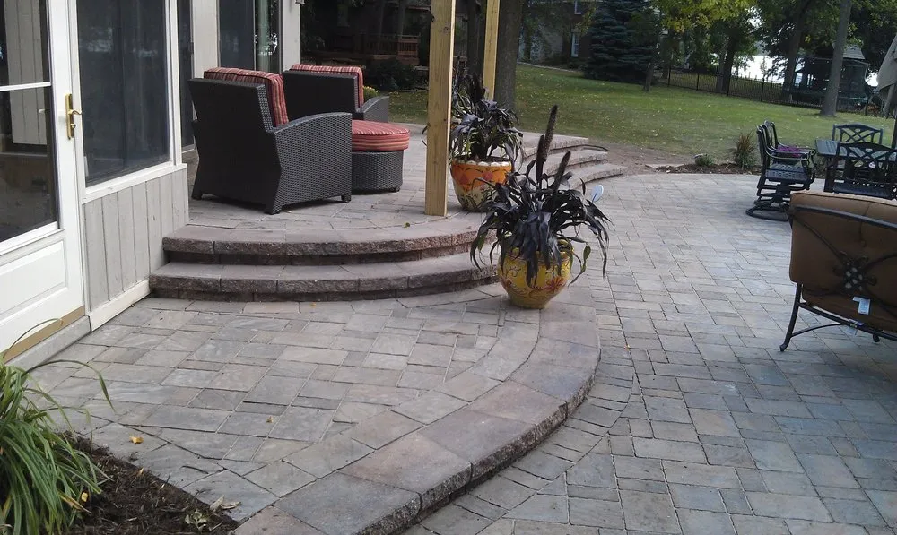 Custom landscape design for residential properties in Kaukauna, WI by Vosters Custom Brick