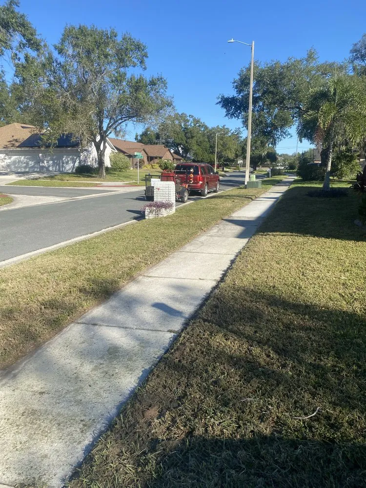 Professional yard maintenance for year-round maintenance in Dover, FL by VTuro Lawn Care