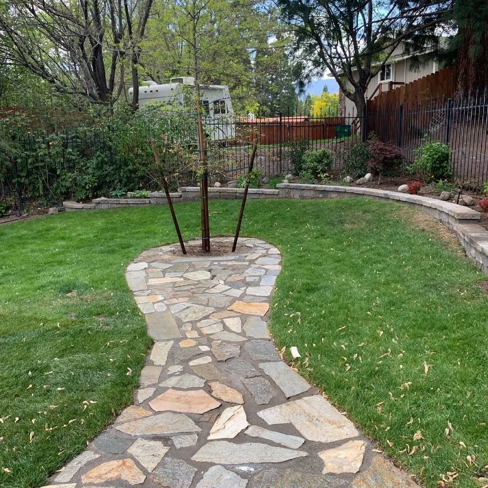 Professional lawn mowing service for residential properties in Spanish Springs, NV by Vulliety Custom Hardscape