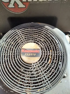 W Taylor's Lawn Maintenance Logo