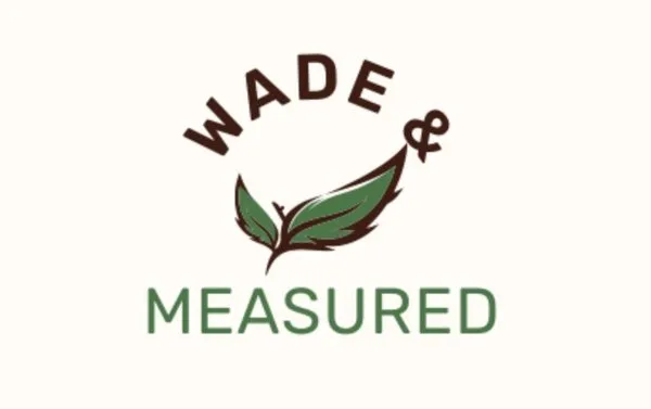 Wade & Measured Lawn Services Logo