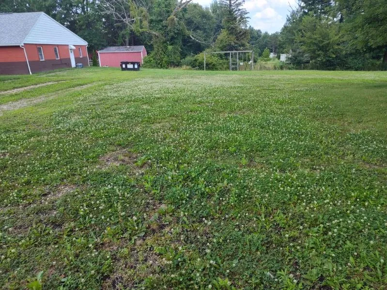 Professional landscape installation for residential properties in Medina, OH by Wades Lawn Care