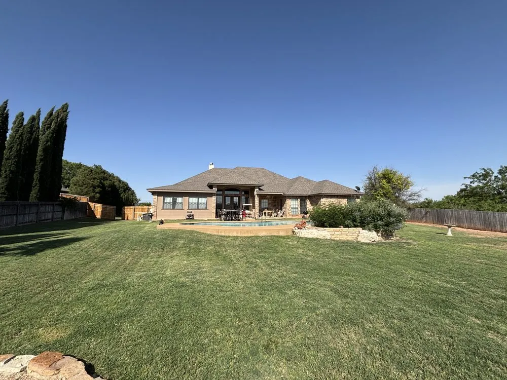 Custom yard cleanup service with custom design across San Angelo, TX - Wadkinscapes