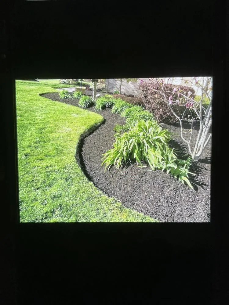 Custom garden landscaping for outdoor upgrades in Redford Charter Twp, MI by Wakefields Complete Outdoor Service's