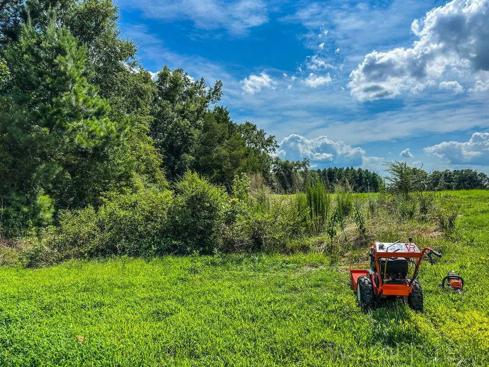 Trusted lawn mowing service for residential properties in Stem, NC by Walco Property Maintenance & Lawn Care