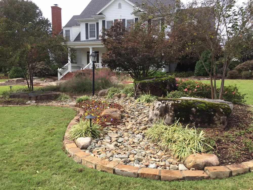 Professional yard maintenance for residential properties in Van Buren, AR by Walker Michael landscapes