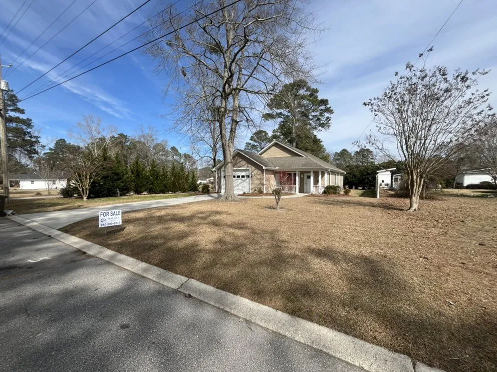 Expert lawn mowing service for outdoor upgrades across Garland, NC - Walker REIG