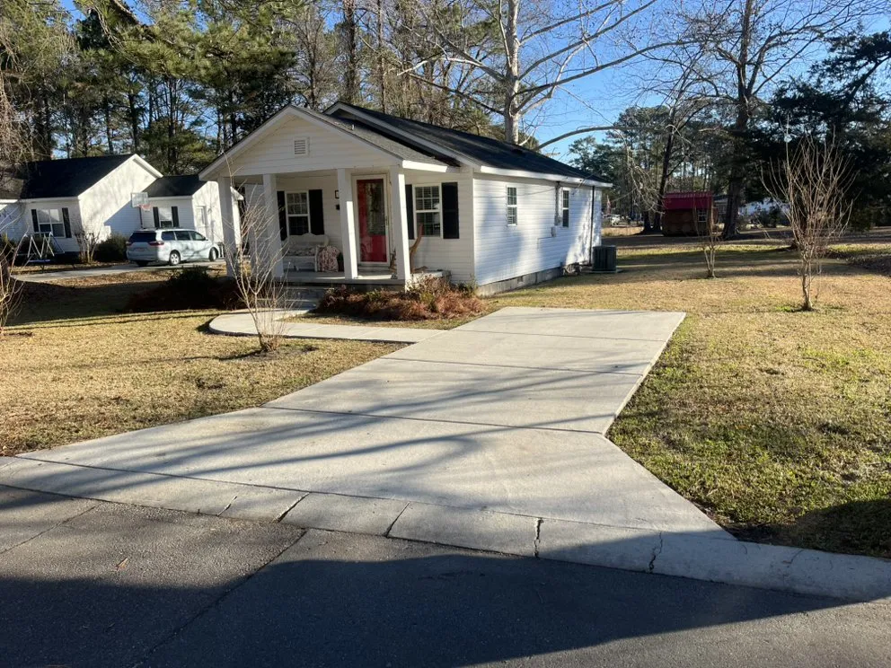Custom landscape design with custom design in Garland, NC by Walker REIG