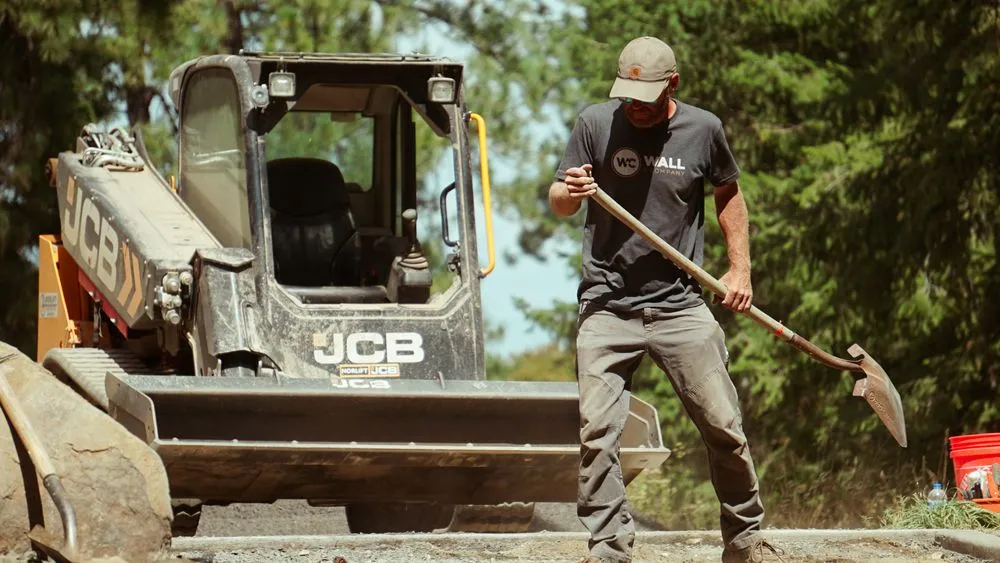 Affordable yard cleanup service in Spokane Valley, WA by Wall and Company