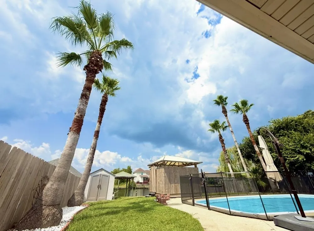 Custom landscape installation with custom design in Slidell, LA by Wallace Tree & Property Services