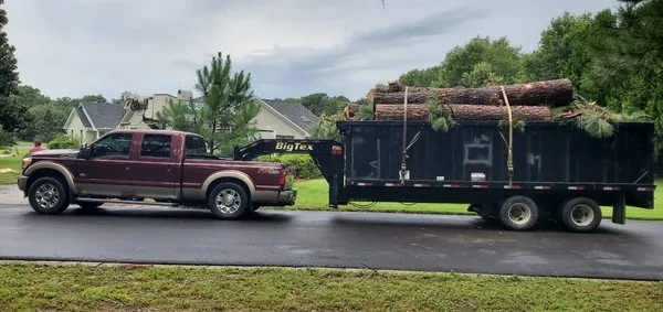 Walt's Lawn and Tree Service Logo
