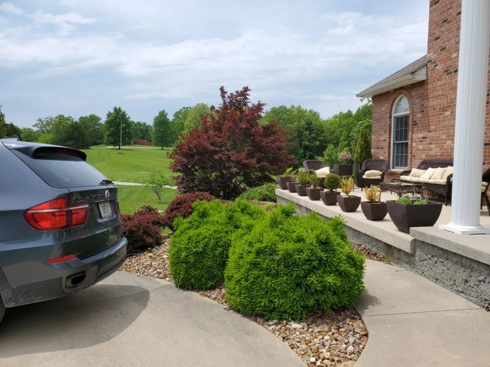 Custom outdoor landscaping in Saint Robert, MO by WAMC1 Lawn Care and Landscaping