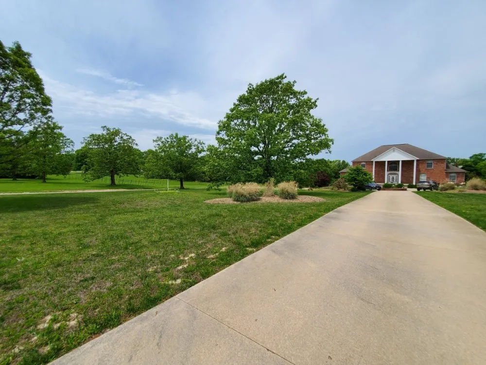 Expert yard cleanup service for residential properties across Saint Robert, MO - WAMC1 Lawn Care and Landscaping