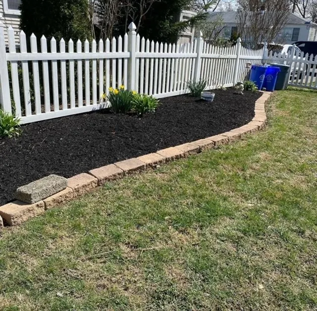 Custom landscape design with custom design in Woodbury, NJ by Warner's Lawn Care