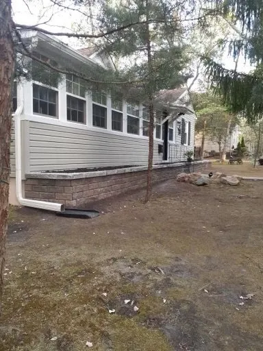 Custom residential landscaping in Woodbury, NJ by Warner's Lawn Care